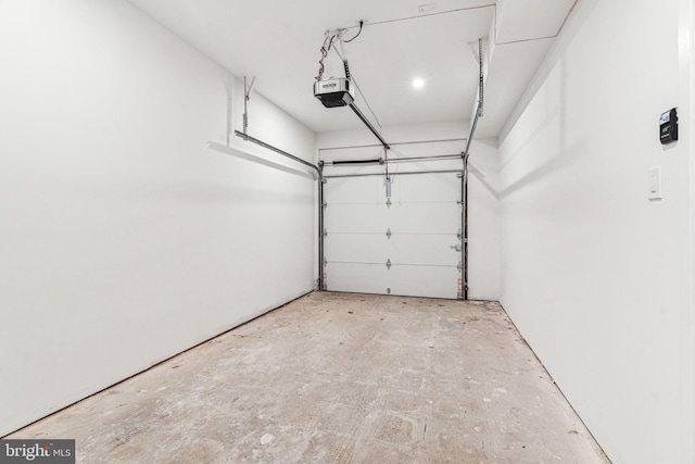 garage featuring a garage door opener