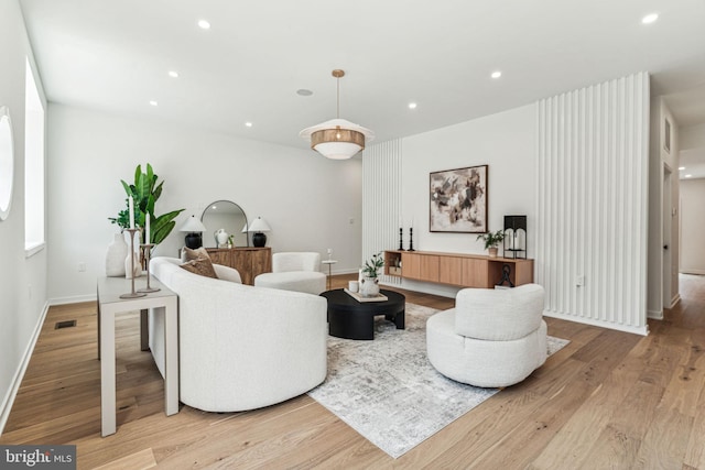 living room with light hardwood / wood-style floors