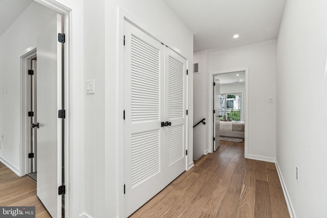 hallway featuring light wood-type flooring