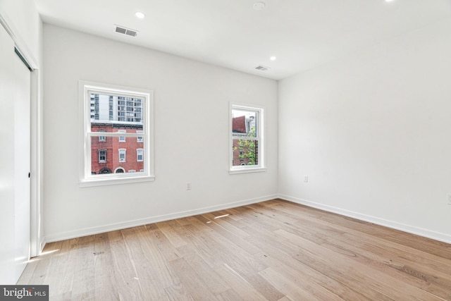 empty room featuring light wood-type flooring