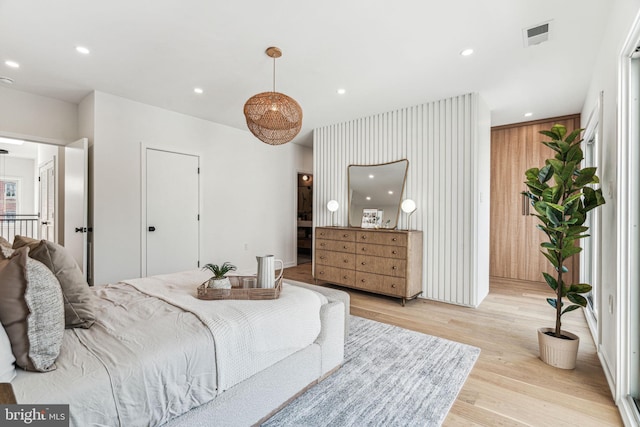 bedroom featuring light hardwood / wood-style flooring