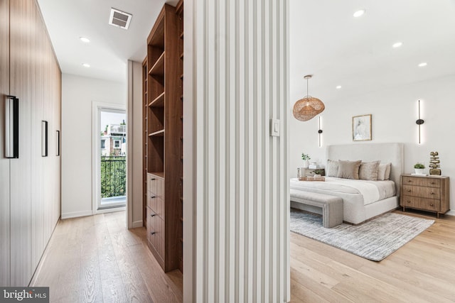 bedroom featuring light hardwood / wood-style floors