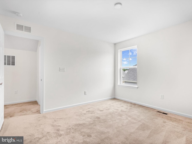 view of carpeted spare room