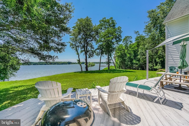 view of patio with a deck with water view