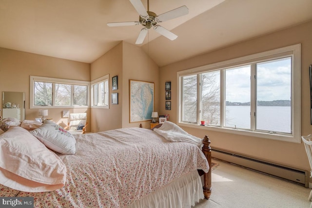 carpeted bedroom featuring ceiling fan, a water view, a baseboard radiator, and multiple windows