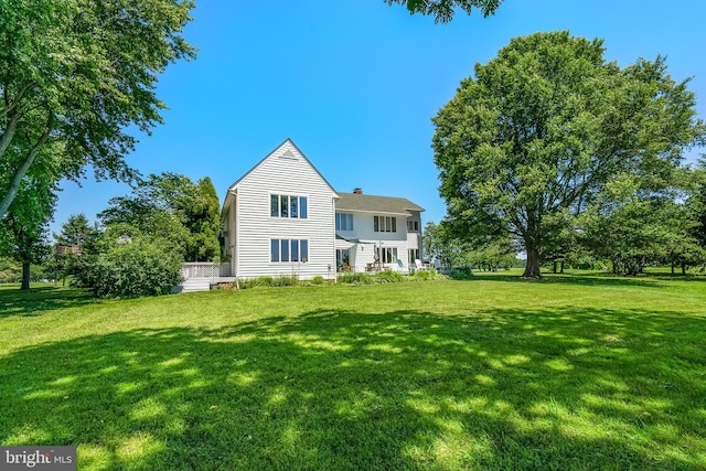 exterior space featuring a lawn