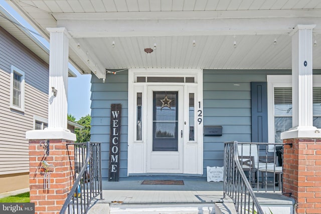 doorway to property with a porch