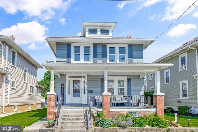 view of front facade featuring covered porch