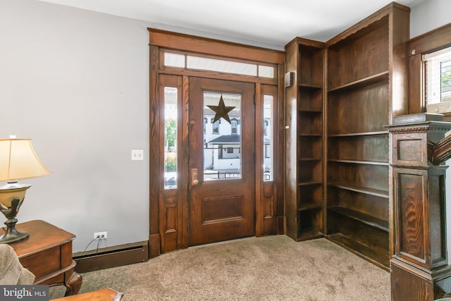 foyer entrance featuring carpet floors