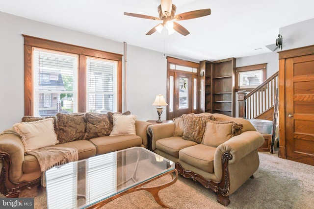 living room featuring ceiling fan