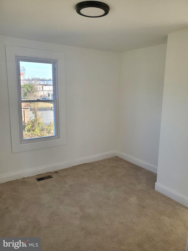 view of carpeted spare room