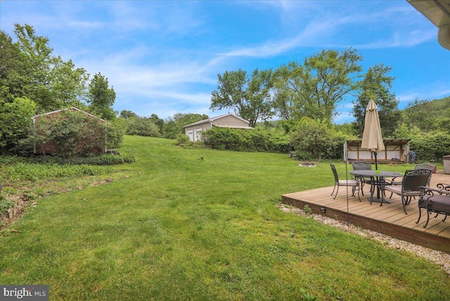 view of yard with a deck