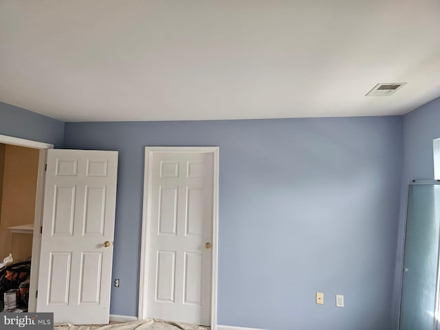 unfurnished bedroom featuring carpet floors