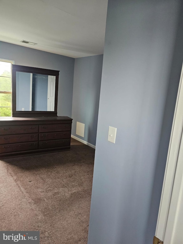 unfurnished bedroom featuring carpet floors