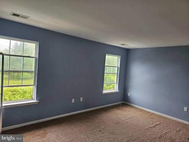 view of carpeted spare room