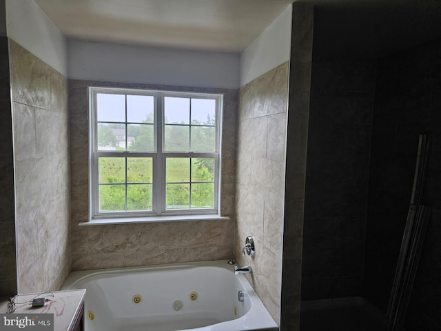 bathroom with a wealth of natural light and vanity