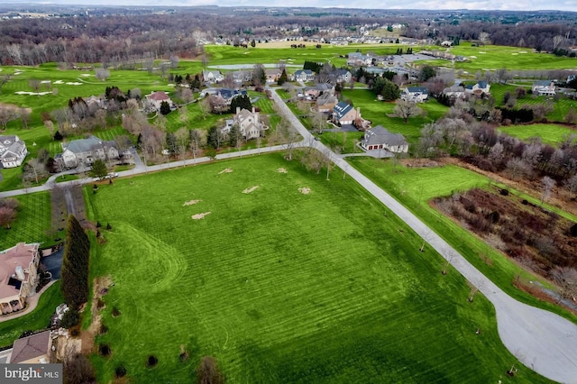 birds eye view of property with a rural view