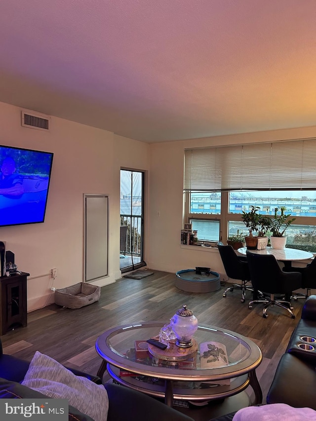 living room featuring dark hardwood / wood-style flooring