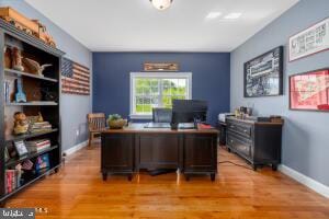 office space featuring light hardwood / wood-style floors