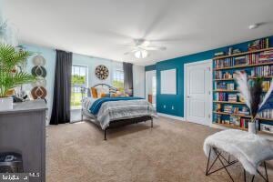 bedroom featuring carpet flooring and ceiling fan