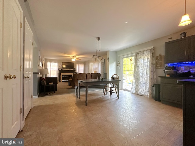 dining space with ceiling fan