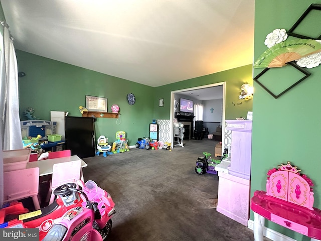 recreation room featuring carpet flooring