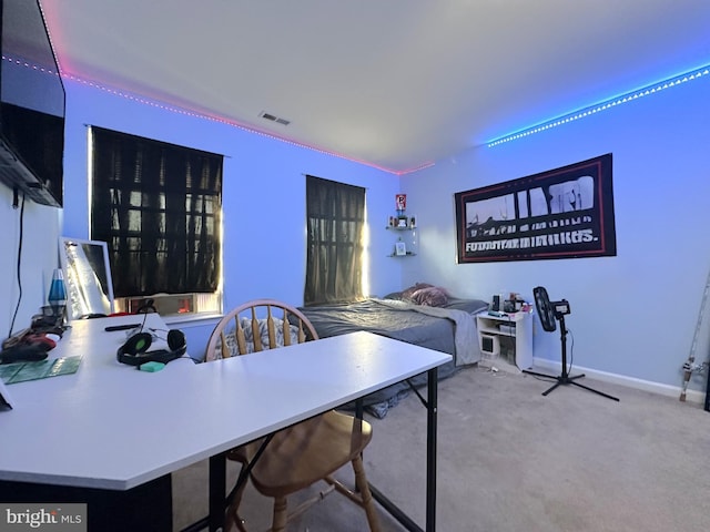 dining area featuring carpet floors