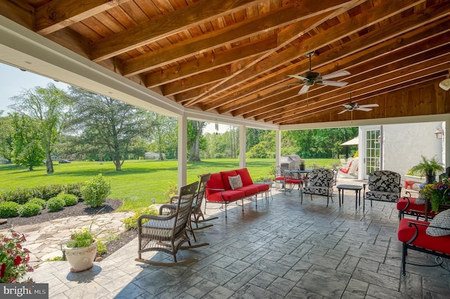 view of patio featuring an outdoor living space and ceiling fan