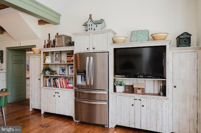 kitchen with stainless steel refrigerator with ice dispenser, white cabinetry, and dark wood-type flooring