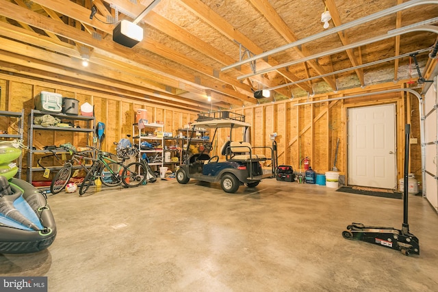 garage featuring a garage door opener