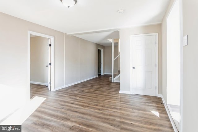 spare room with hardwood / wood-style flooring