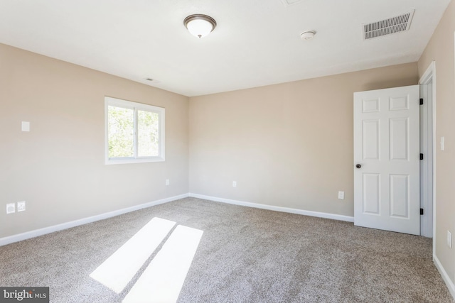 unfurnished room featuring carpet flooring