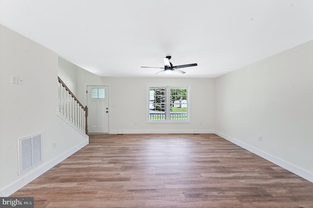 interior space with ceiling fan and light wood-type flooring