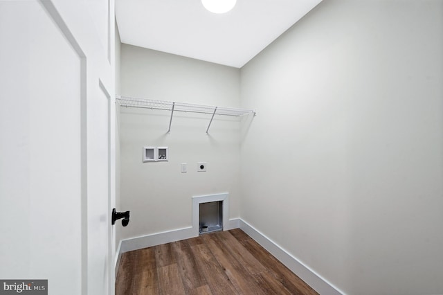 washroom with electric dryer hookup, hookup for a washing machine, and dark wood-type flooring