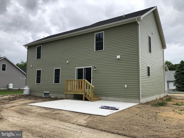 back of property featuring a patio