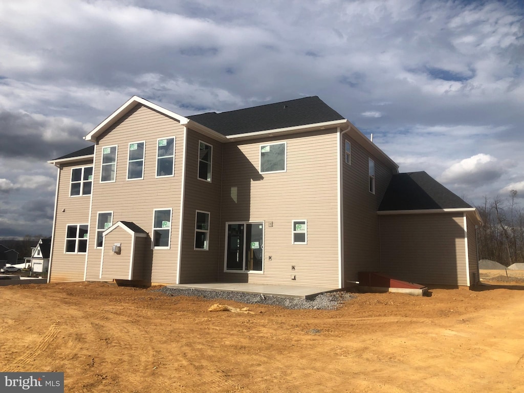 back of property featuring a patio