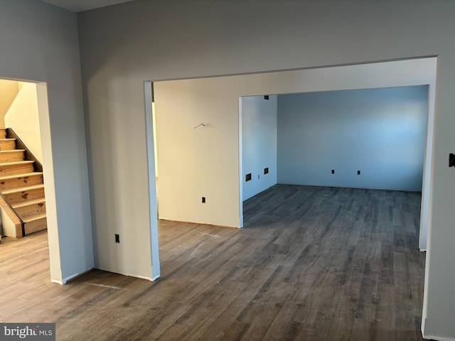 spare room with hardwood / wood-style floors