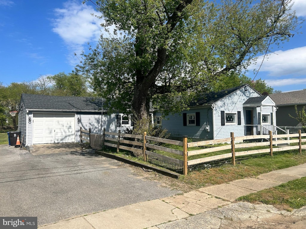 ranch-style home with a garage