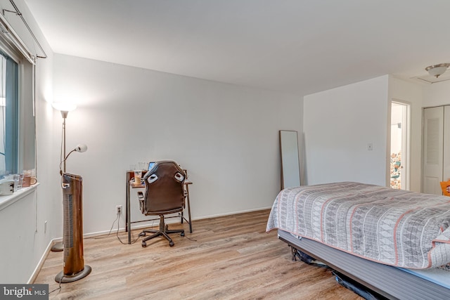 bedroom featuring light wood-type flooring