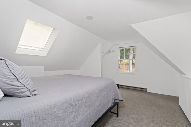 bedroom featuring vaulted ceiling with skylight, light colored carpet, and a baseboard heating unit