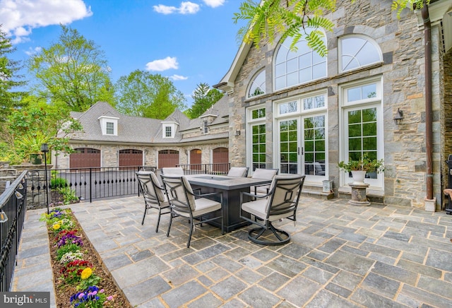 view of patio featuring french doors