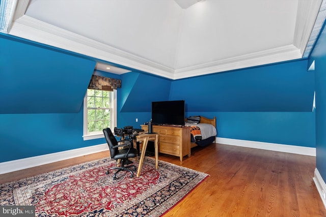 office space with crown molding and hardwood / wood-style floors