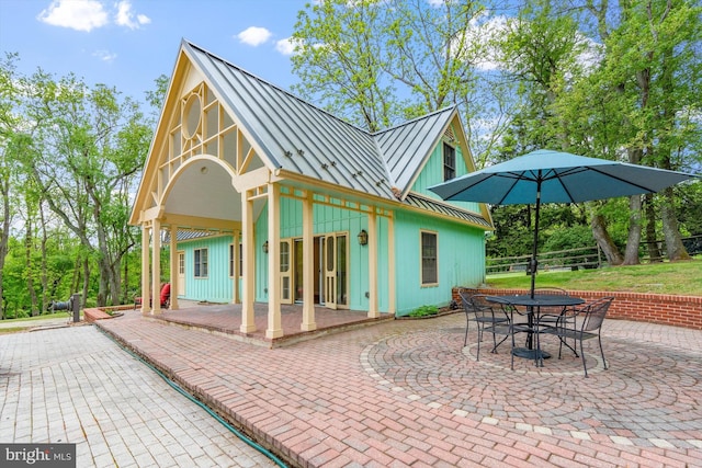 rear view of property with a patio area