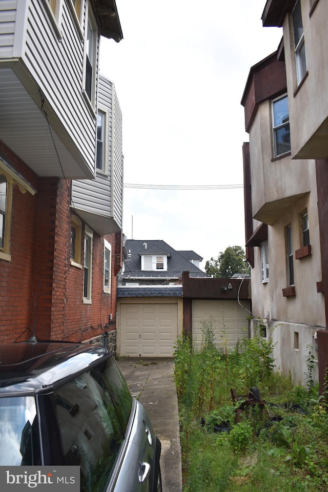 exterior space with a garage