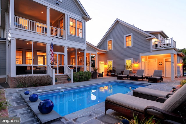 view of pool featuring an outdoor hangout area and a patio area