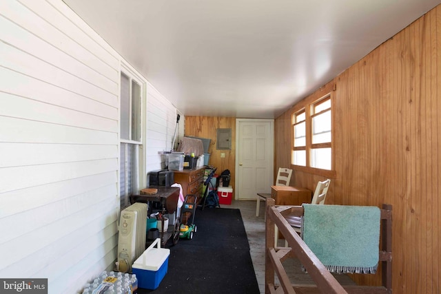 interior space featuring wooden walls