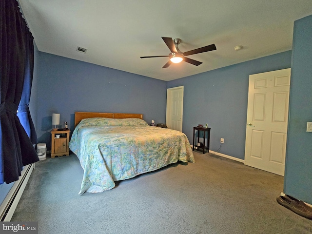 carpeted bedroom with a baseboard radiator and ceiling fan