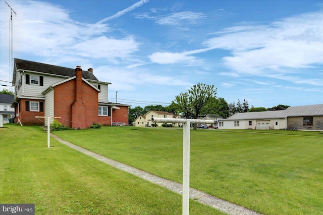 view of yard featuring an attached garage