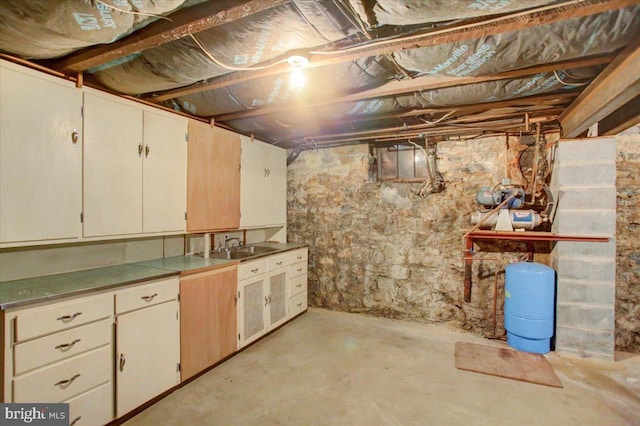 unfinished below grade area featuring a sink