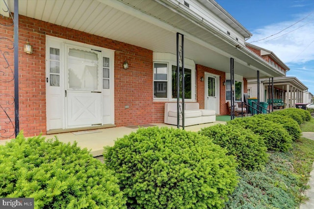 property entrance with a porch